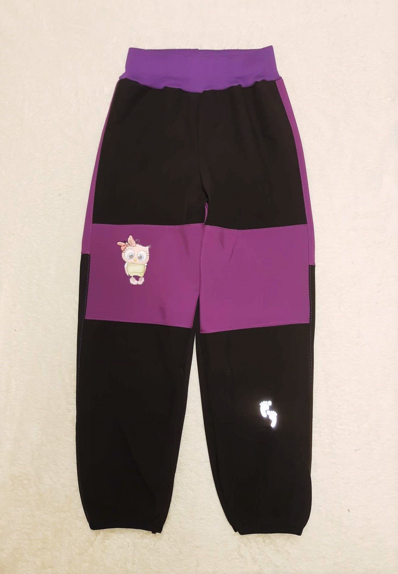 Softshellové kalhoty s fleecem,nohavice zakončené lemovací gumičkou  vel. 110, černo fialové 