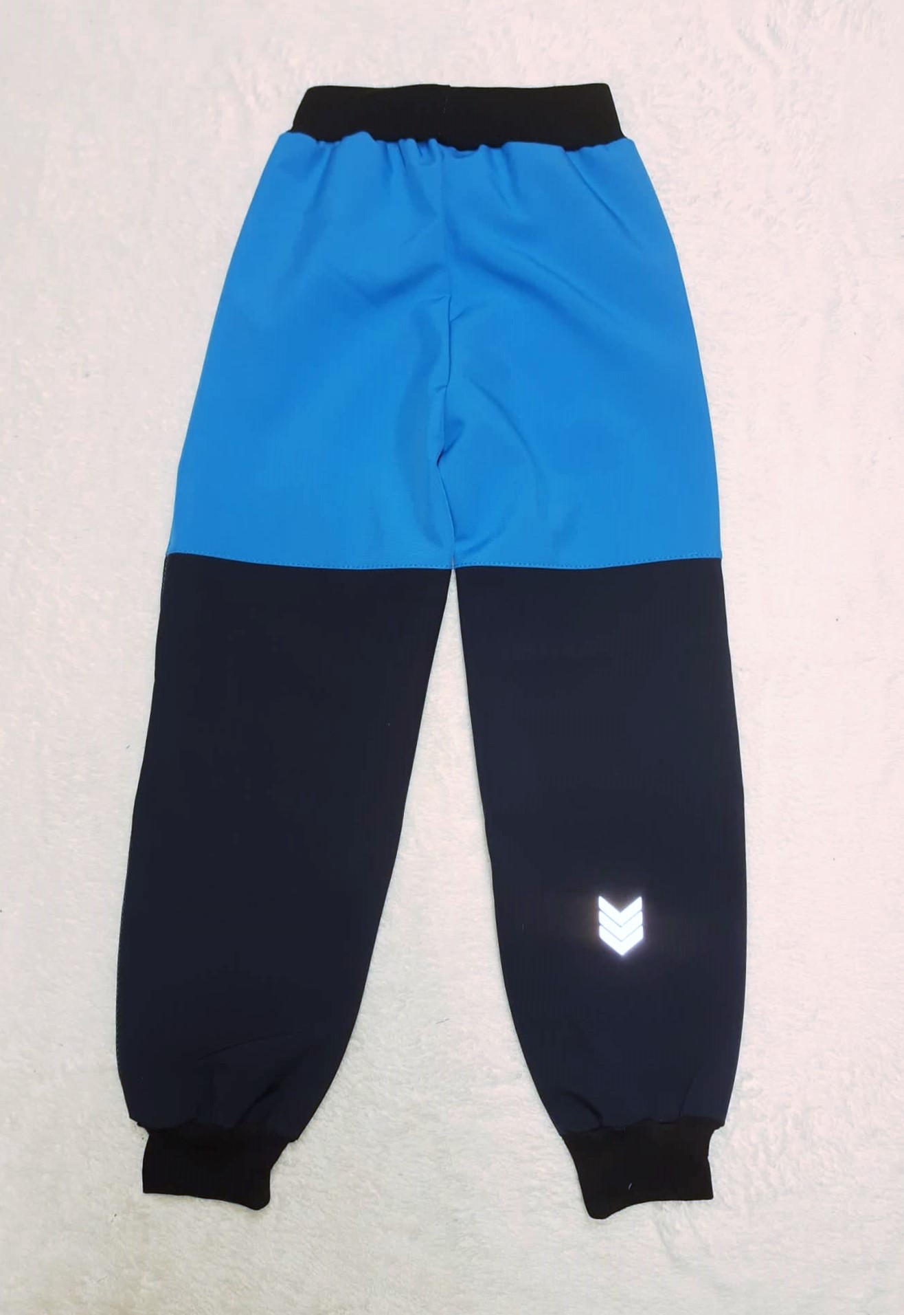 Softshellové kalhoty s fllce vrstvou, vel. 116,Tm. modré s tyrkys a reflexními prvky